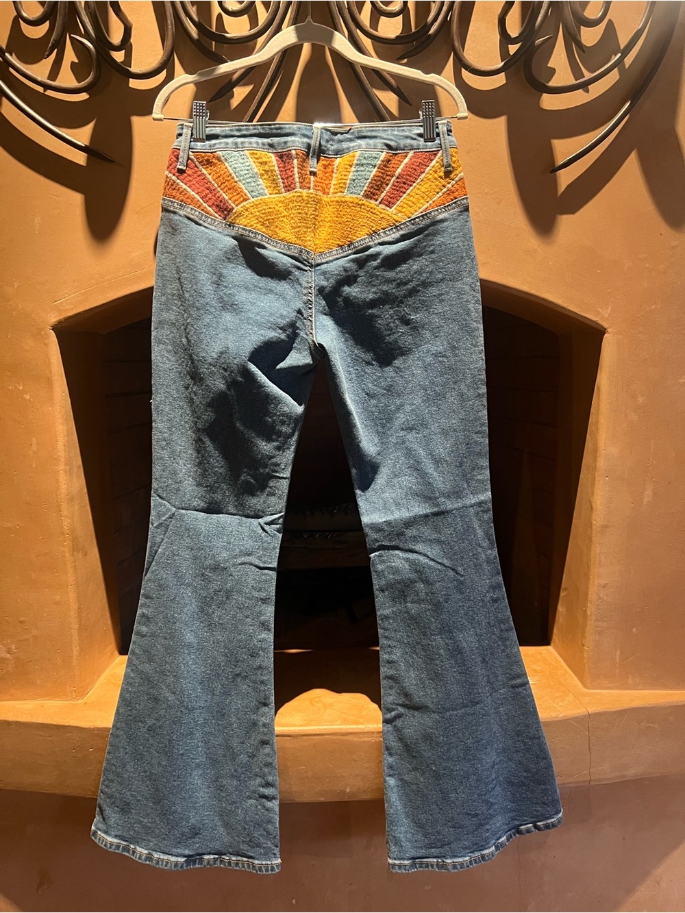 Driftwood Women’s Blue Flared Jeans with Orange Sunburst Embroidery